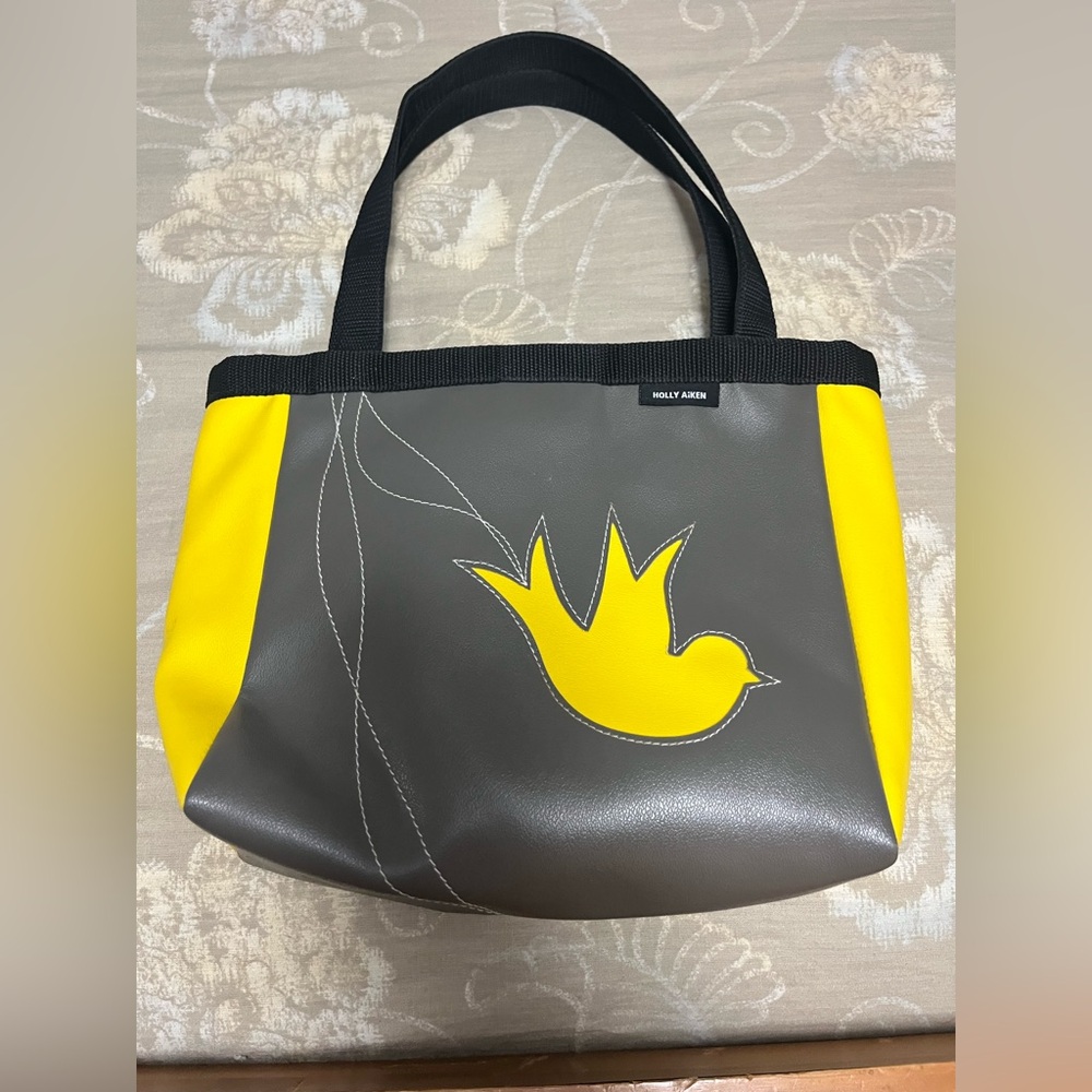 Holly Aiken signature stitch bird tote from the original Raleigh flagship store.